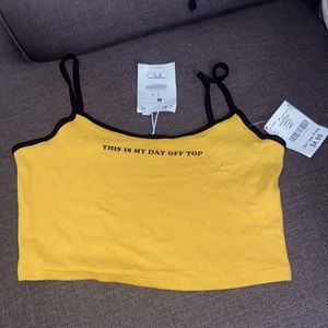 Small Mustard yellow/gold with black tank top.